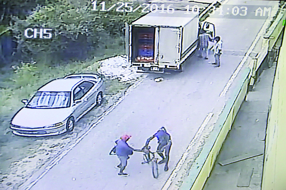 The surveillance footage obtained shows the bandits making off with an undisclosed sum of cash