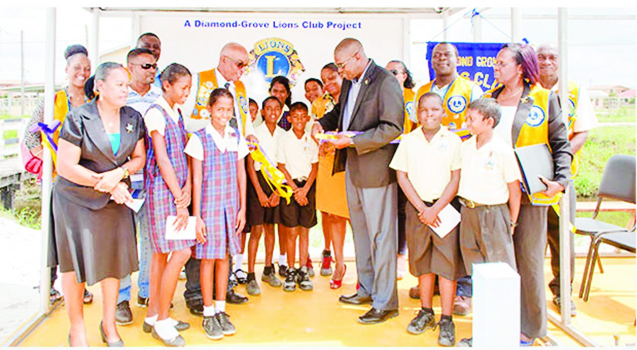 Lions Club erects bus shed in Diamond - Guyana Times