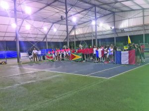 The teams stand at the opening ceremony for the singing of their National Anthems of each nation  