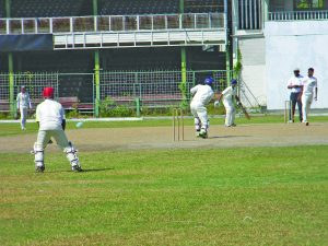 Alphius Bookie drives confidently against Mark Ramsammy who was threatening to take the match away from Christ Church Secondary at Bourda 