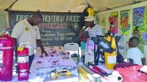 Participants visiting the booths at the community outreach