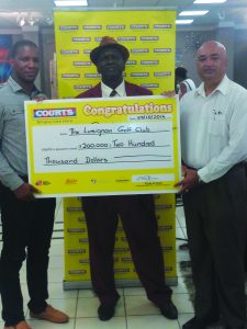 Courts Marketing Manager, Pernell Cummins, Public Relations Officer of the LCC, Guy Griffith and President of LCC, Oncar Ramroop at the symbolic sponsorship cheque handing over 