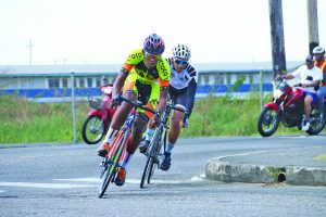 Leading the way!  Hard work and determination ensured the Team Coco rider endured the tough conditions to cross the finish line  first (Marceano Narine Photo)