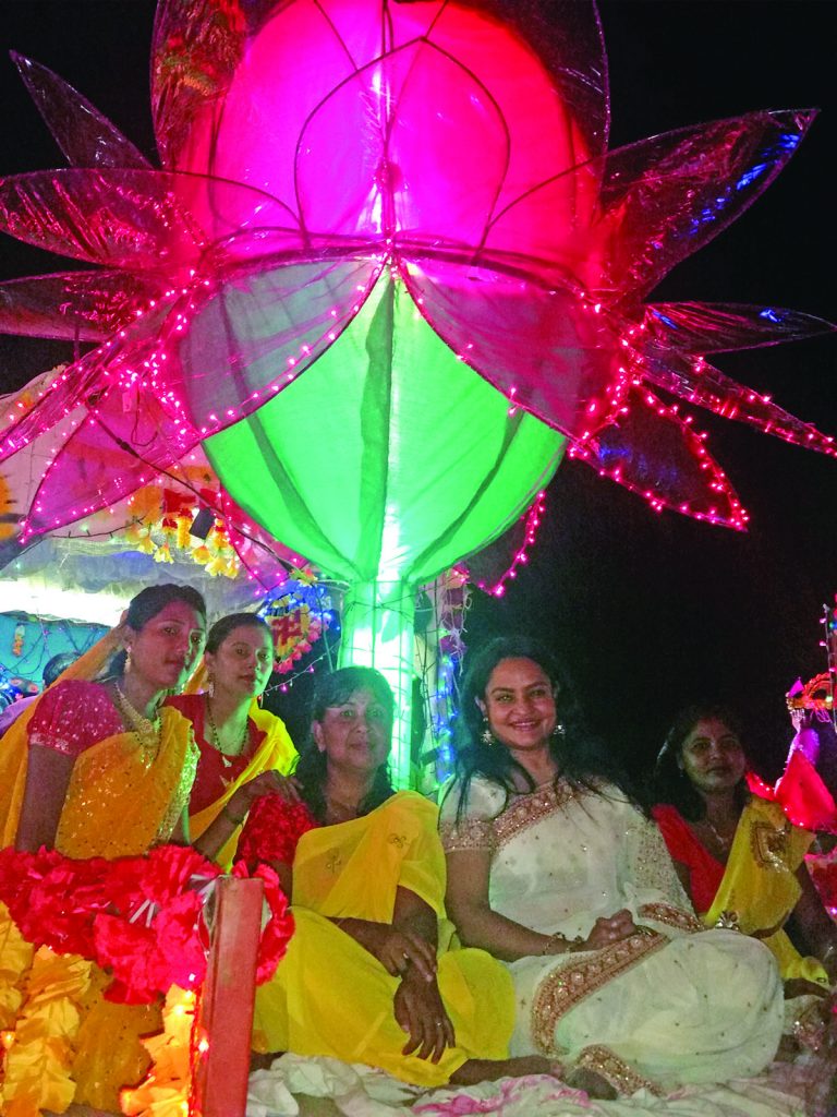 President of the Sabha, Dr Vindhya Persaud (in white) sitting with members