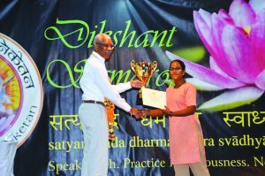 The top student of SVN Ramkumarie Ramdass receiving the President’s award from President David Granger