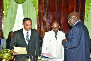 Vickram Bharrat being sworn in as the newest PPP/C MP before Clerk of the National Assembly, Sherlock Isaacs on Thursday 