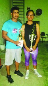 Daniel Sooklall and Tiniesha Toney display their prizes