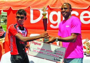 Flashback! Two-time defending champion Raynauth Jeffrey receiving his prize from then  Digicel, CEO Gregory Dean 