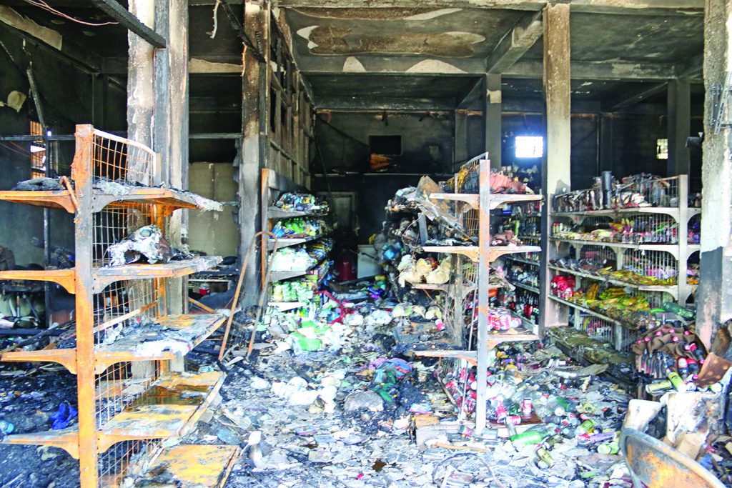 The bottom flat of the store was completely ravaged by fire