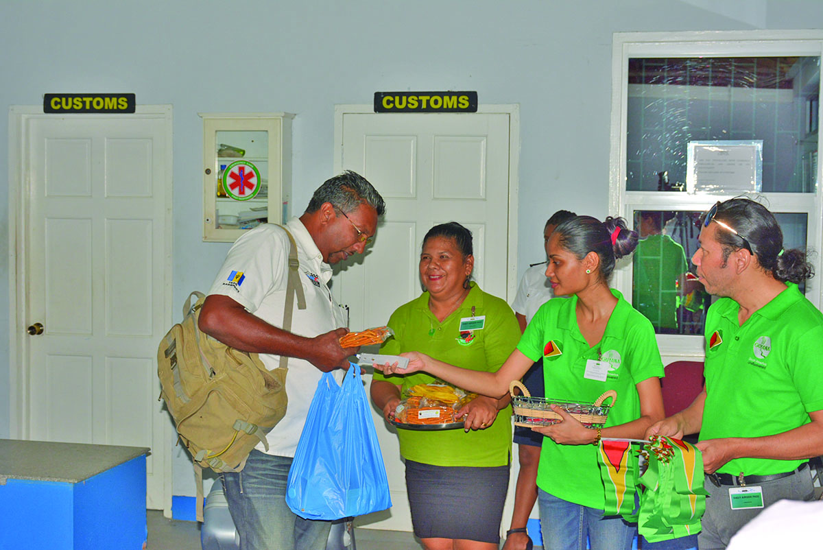 Staff from the GTA welcoming visitors to Guyana