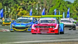 Mark Maloney  (red car) will be one of the top drivers expected to  give the Guyanese fans a treat  