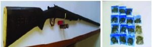 The shotgun, three cartridges and cannabis that were found at Omai Landing, Region Eight 
