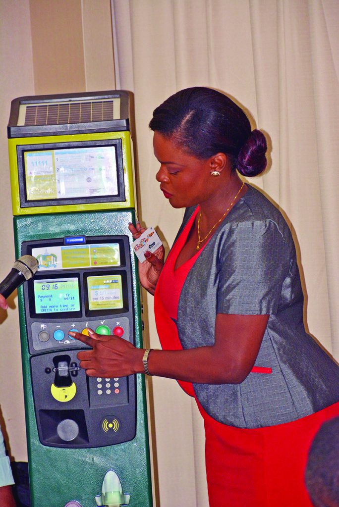 A demonstration of how the parking meter works at the Marriot Hotel on Friday