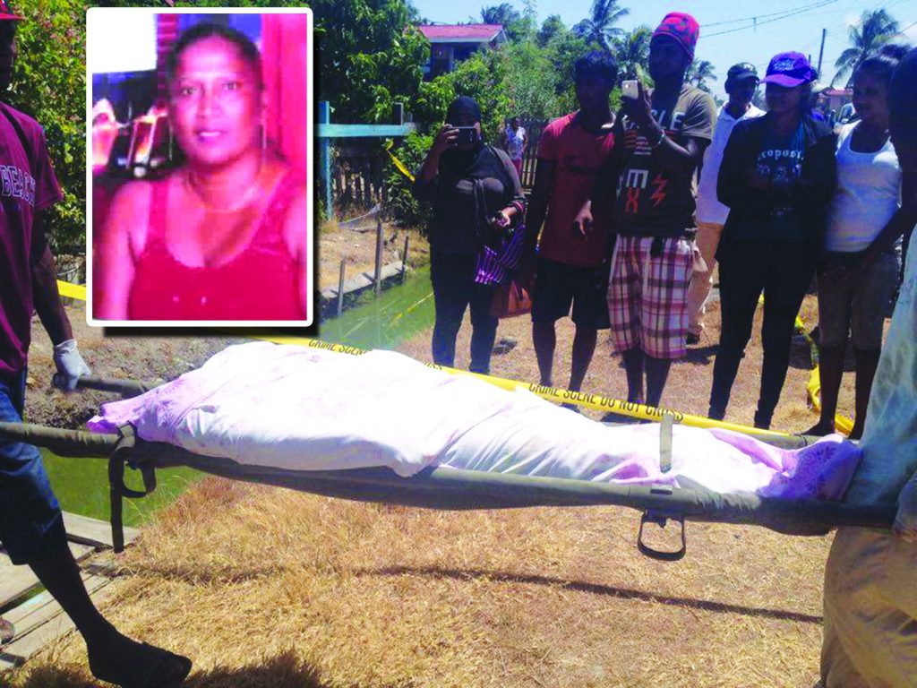 The bod of  Bhumattie Delall  being removed from her home 