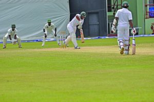 Jaguars opener Rajendra Chandrika drives past Derval Green at Providence  