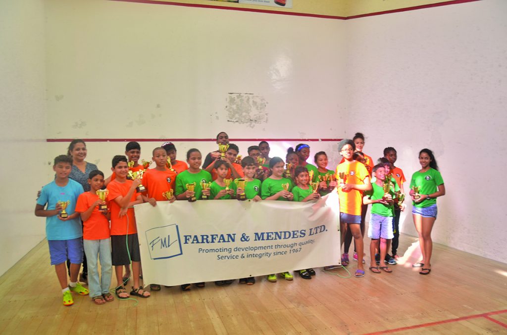 All smiles! The various prize winners at the tournament  along with Karen Gomes (far left), representative of Farfan & Mendes 