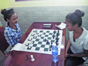 WCM Sheriffa Ali took 3rd, outplaying Nellisha Johnson in a Guicco Piano Opening in round 5 