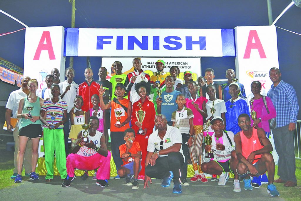  Winners of the Guyana leg, South American 10k display their silverware (Marceano Narine Photo)