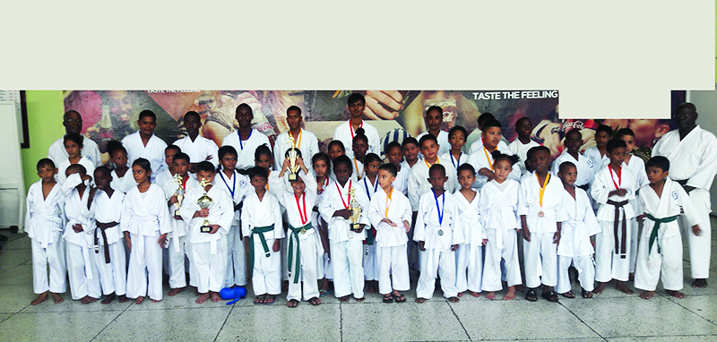 Participants display their prizes in the presence of officials of the GWRKA