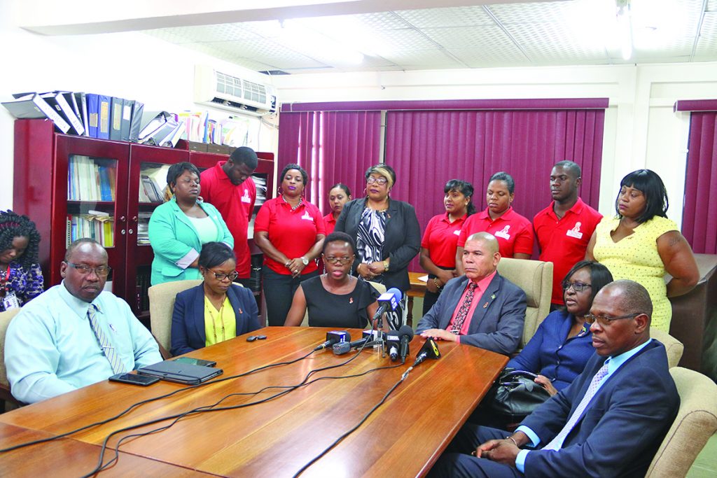 Public Health Minister, Dr George Norton and Junior Public Health Minister, Dr Karen Cummings along with representatives of NAPS at the national days of testing launch on Wednesday  