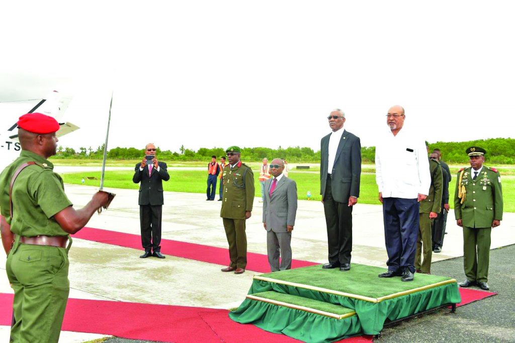 President David Granger and President Désiré Delano Bouterse being accorded the Guard of Honour Salute at the Eugene F. Correia International Airport 