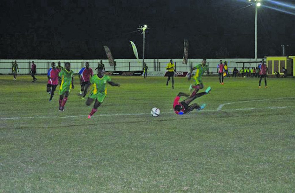 Part of the action between Guyana Defence Force (green) and Monedderlust at the #5 ground, West Berbice  