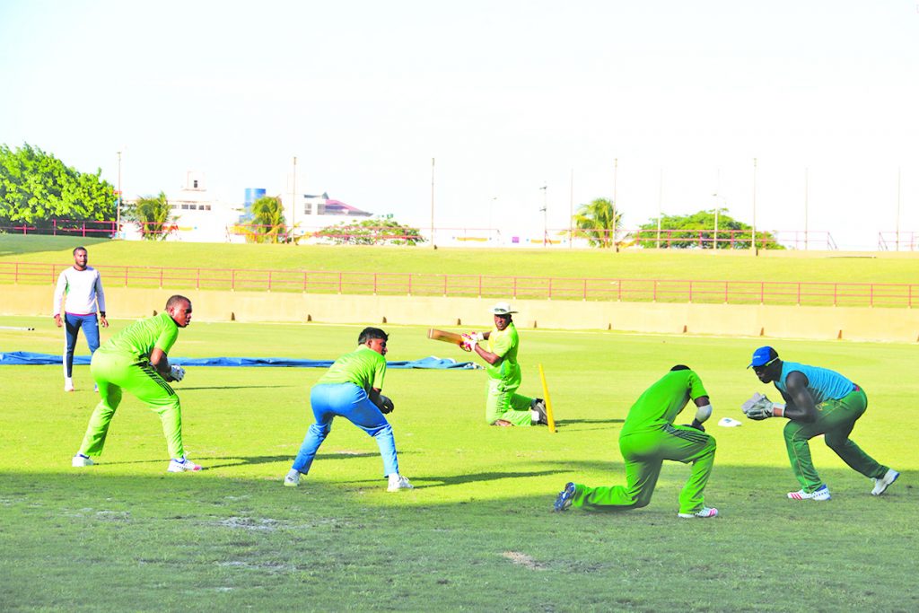 After putting down a number of catches in their recent match against the Barbados Pride, the Guyana Jaguars head coach Esuan Crandon is taking his troops through slip catching drills at Providence on Wednesday. From left; Christopher Barnwell, Rajendra Chandrika, Leon Johnson and wicket keeper Anthony Bramble. The Jaguars host Red Force from Friday at Providence 
