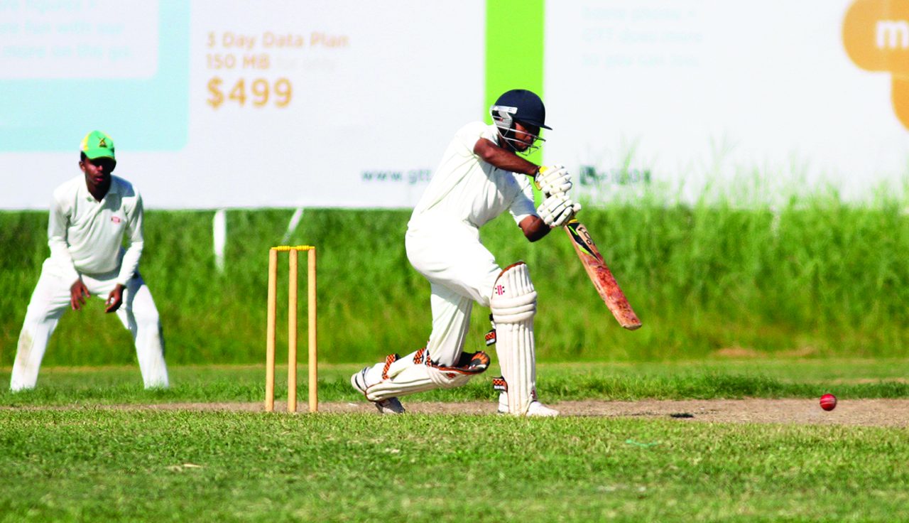 Khemraj Ramdeen plays a perfect straight drive in his top score of 97 at the Everest Cricket Club
