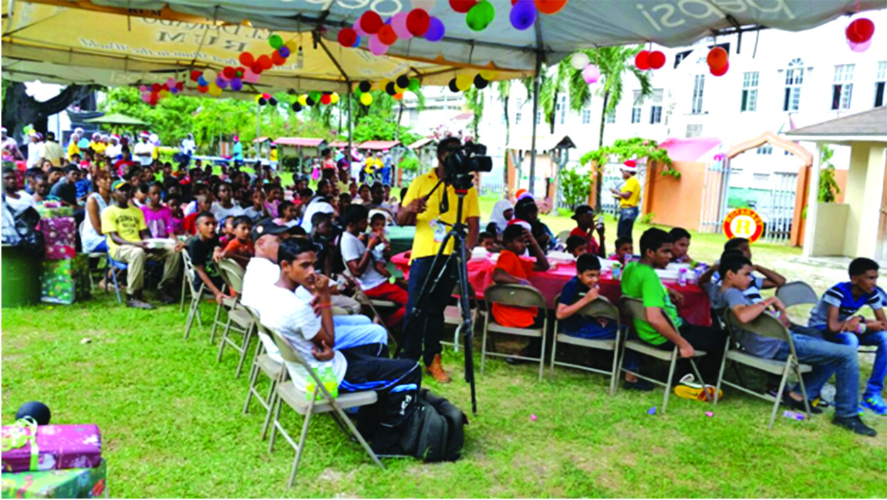 Rotaract Club of Georgetown brings ‘Christmas Cheer’ to 124 children