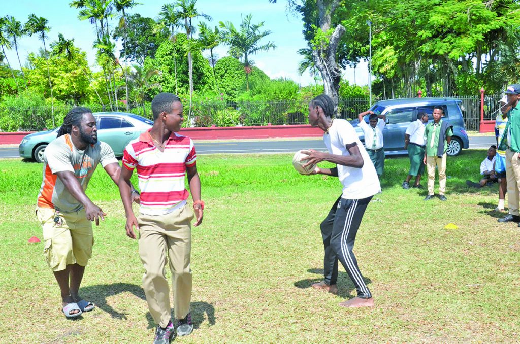 Players from St. John’s College undergoing drills under the watchful eyes of Theodore Henry at the Parade ground on Thursday
