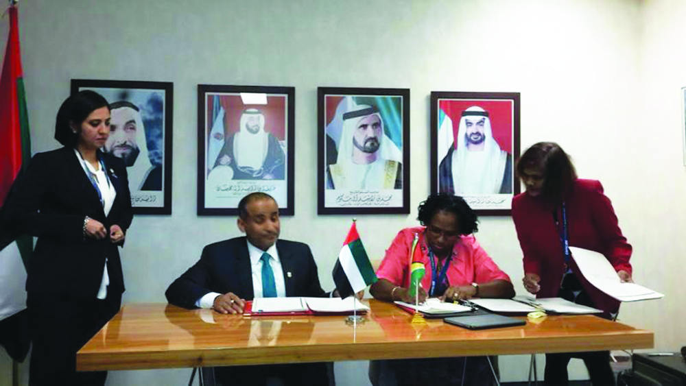 Minister within Public Infrastructure Ministry Annette Ferguson signing the agreement