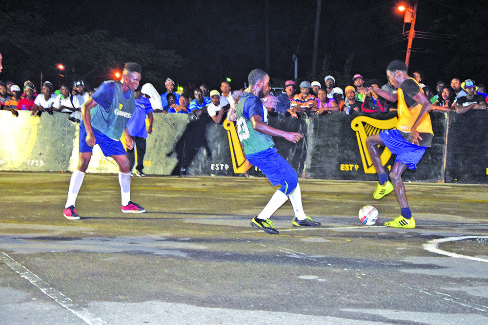 Dennis Edwards (left) and Delon Williams (centre)  have been a part of a Tucville team that has a compact defence 