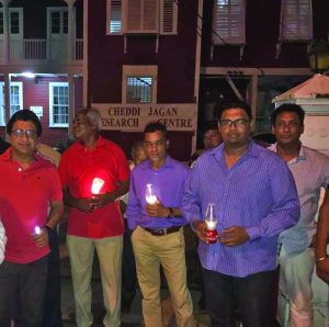 PPP Executive Members at the peaceful candlelight vigil on Friday night to voice its concerns over Government’s move to evict the Cheddi Jagan Research Centre from Red House