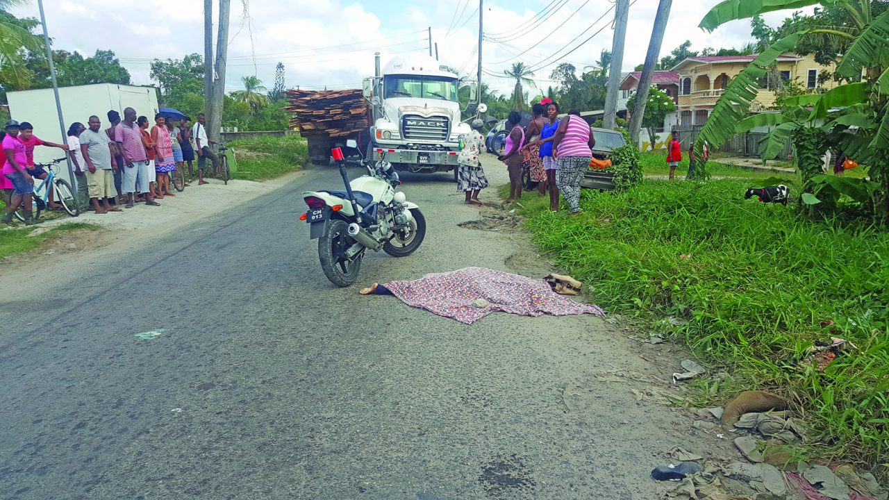 The woman’s body lying on the roadway  