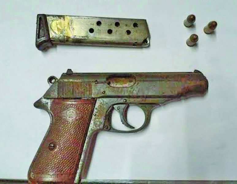 The gun and ammunition which were recovered 