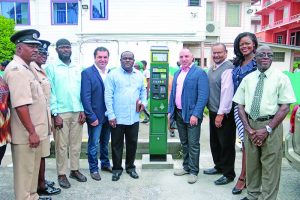 Town Clerk Royston King; Managing Directors of Smart City Solutions, Amir Oren and Simon Moshevilli and other City Hall representatives at the launch of the meters