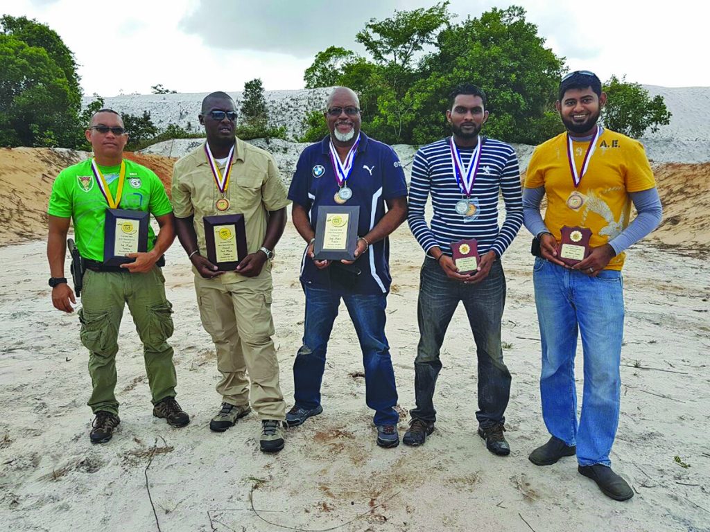 The fantastic five! The GNRA top five marksmen last Sunday from left; Dale Hing, Gordon Richards, Harold ‘Top Gun’ Hopkinson, Surujbali Persaud and Azaad Hassan were more than happy to be awarded 