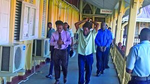 The three accused heading to court for the afternoon session on Wednesday 