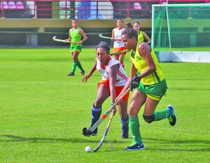 Female MVP Aliyah Gordon (left) works her way through the Hikers’ defence at Providence