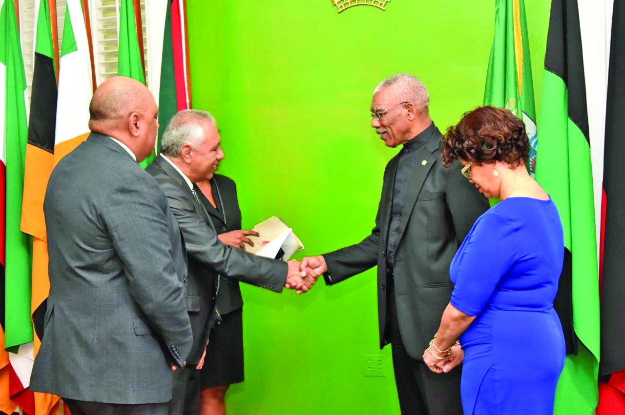 President David Granger exchanges a handshake with the newly-accredited Ambassador Jose Kinn Franco after the ceremony at State House on Wednesday  