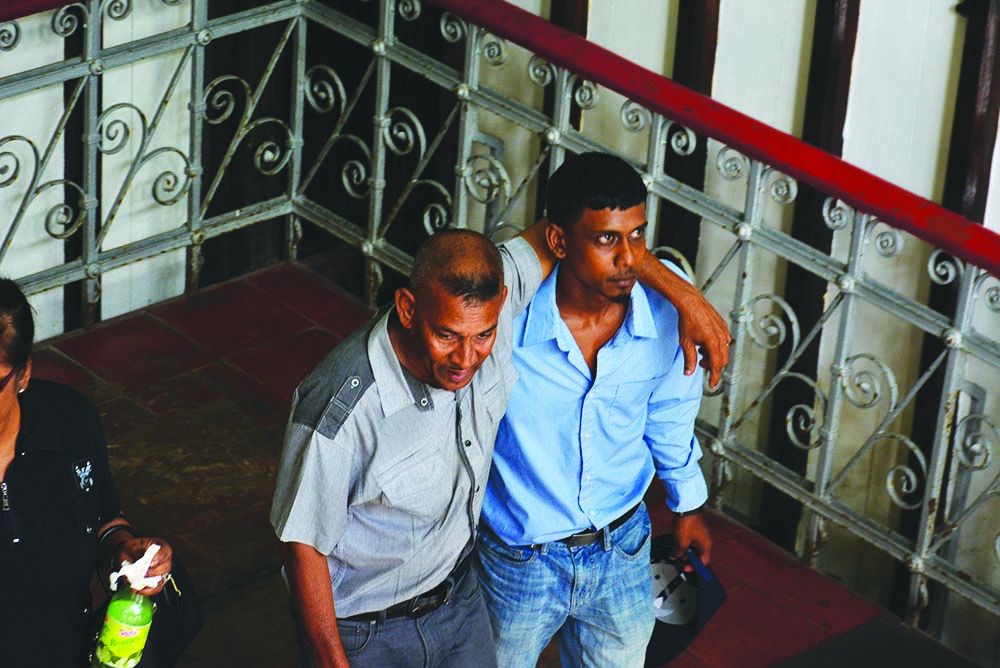 Mahendra Budhan escorted by relatives moments after he was freed 