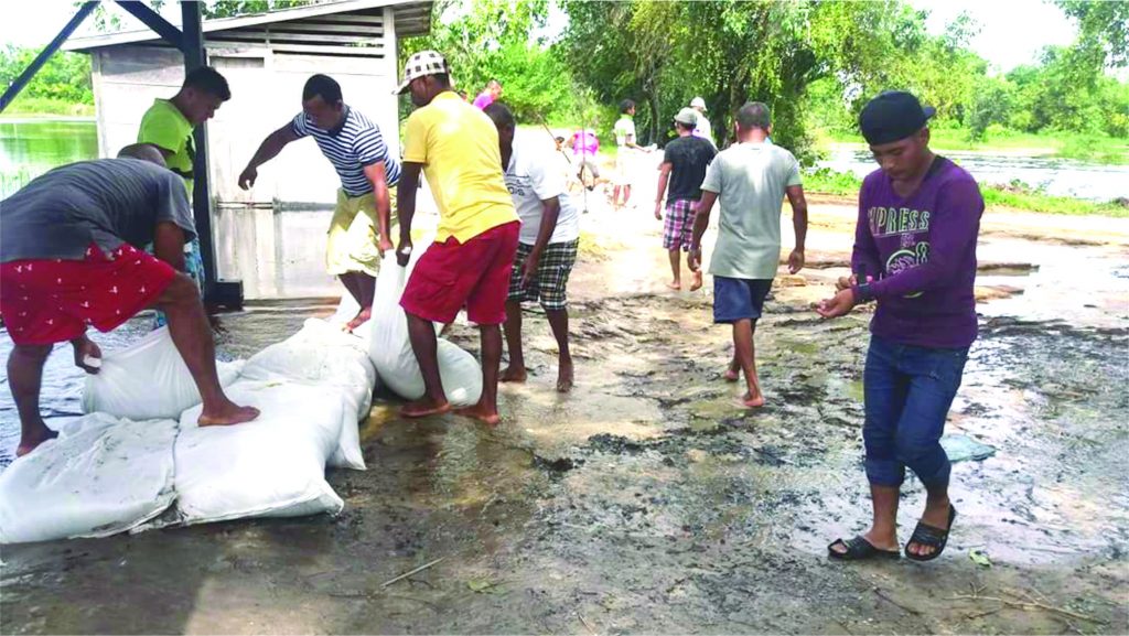 Residents pooled their efforts to stem the flow of water into their community