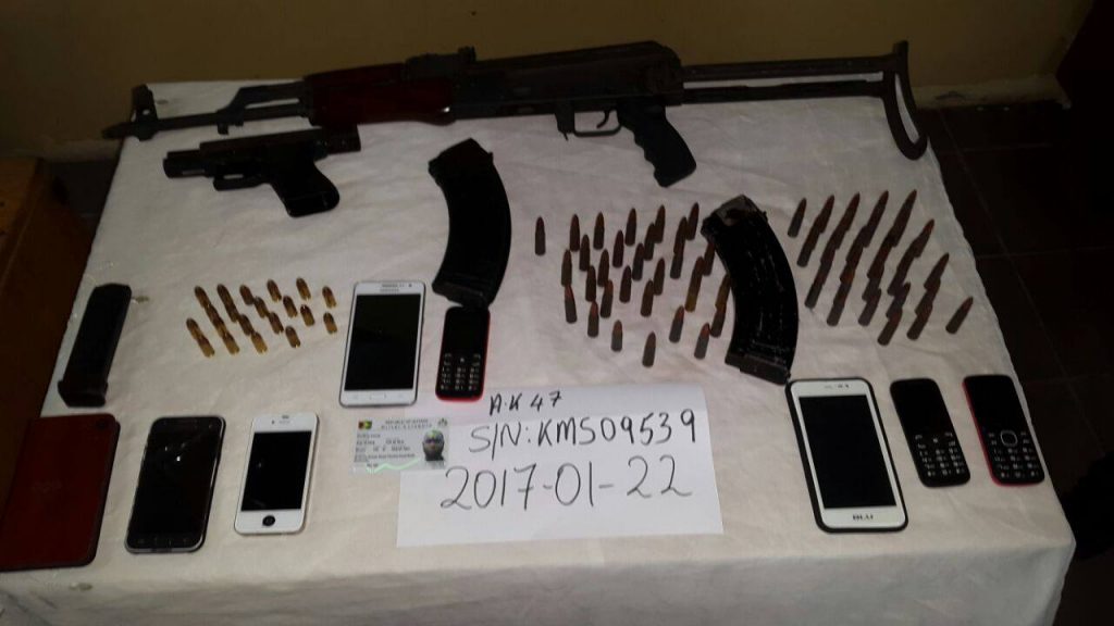 The gun, ammunition and cell phones found during the operation at Campbellville  