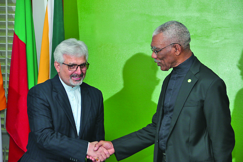 President David Granger shares a light moment with new Iranian Ambassador to Guyana, Mostafa Alaei 