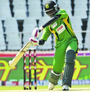 Guyana's batsman Steven Jacobs plays a stroke shot off Lions bowler Ethan O'Reilly, unseen, delivery during the Champions League Twenty20 cricket match at the Wanderers stadium in Johannesburg, South Africa on Sunday Sept. 19, 2010. (AP Photo/Themba Hadebe)