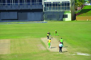 Assad Fudadin hits out against Eon Hopper during the practice match on Wednesday at the National Stadium 