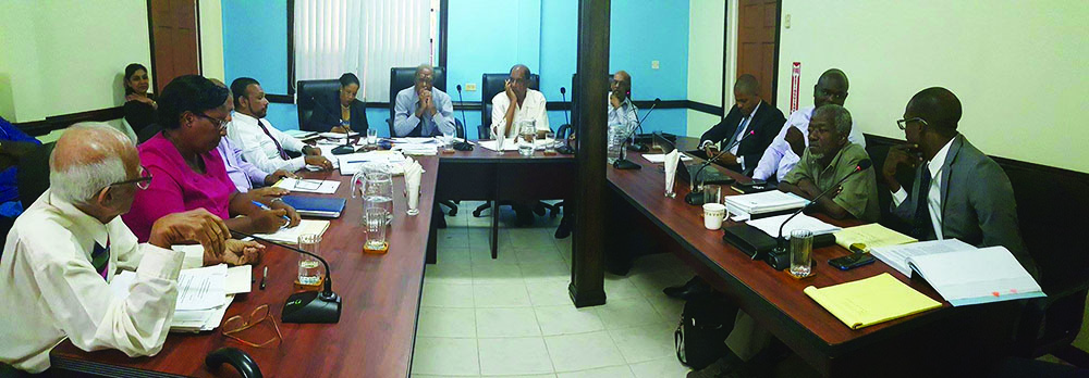 Commissioners of the PUC, along with executives of GCA, meet with executives of GTT in PUC’s conference room on Monday  