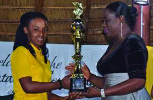  Loushana Toussaint receiving the award for most improved female player at the GCB Annual Award Ceremony from Minister with responsibility for Sport, Nicolette Henry 