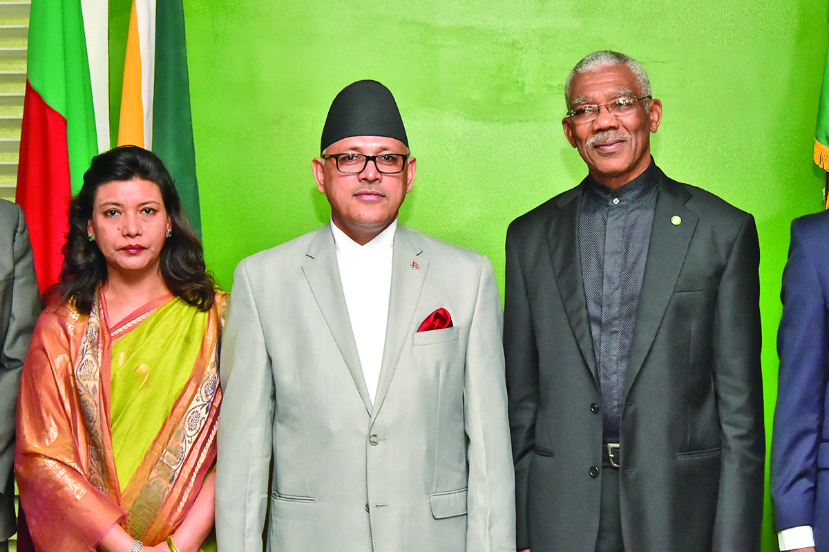President David Granger along with newly accredited Nepalese Ambassador, Dr Arjun Kumar Karki and his wife  