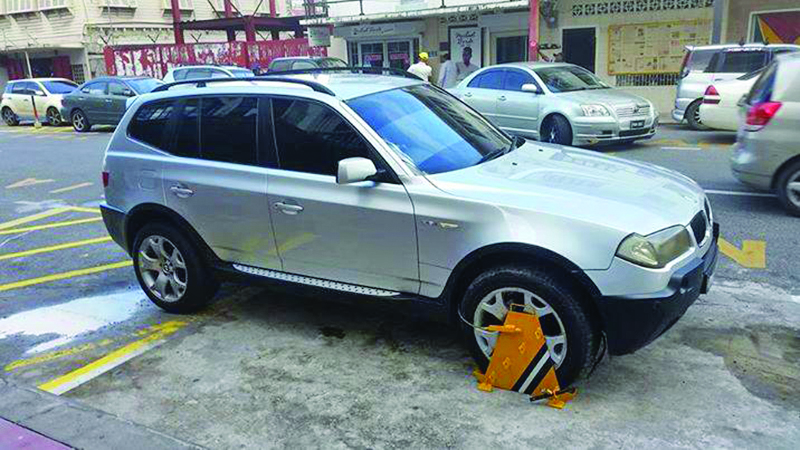 The clamped SUV belonging to former Head of State, Donald Ramotar  